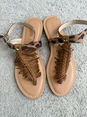 GUESS Braided Fringe T-Strap Sandals with Animal-Print Ankle Strap